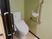 手すり付きトイレの一角