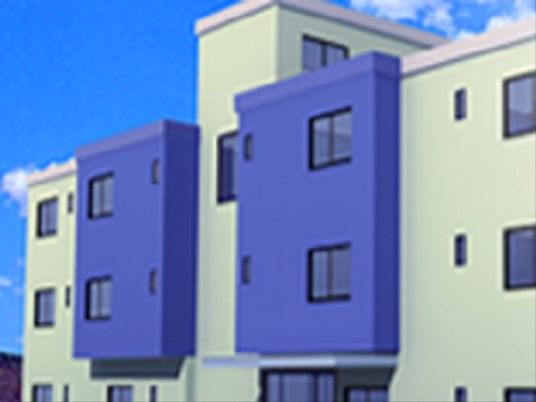 青い外壁の建物外観