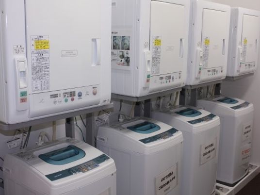 整列した洗濯機群