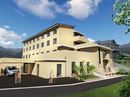 明るい外装の建物正面