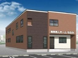 茶色の外壁が特徴の建物