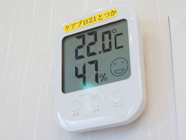温湿度計と快適度示す顔マーク