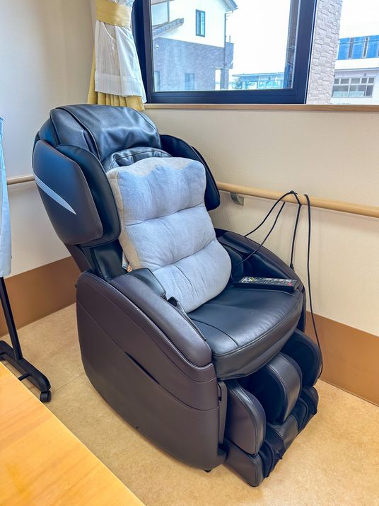マッサージチェアのある部屋