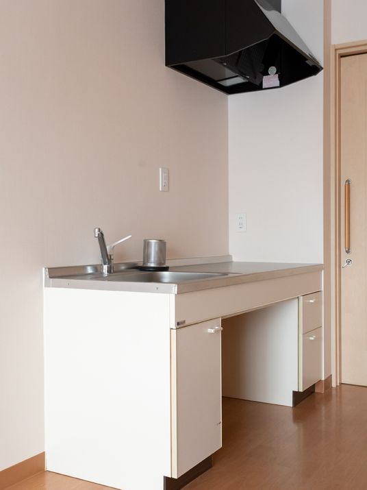 清潔感のある居室のキッチン