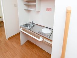 居室の洗面台とコンロ