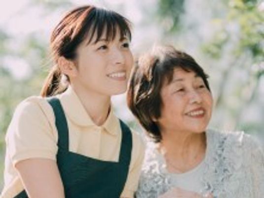 スタッフと利用者の笑顔