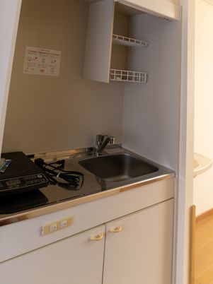 キッチンのシンクとコンロ