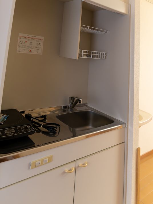 キッチンのシンクとコンロ