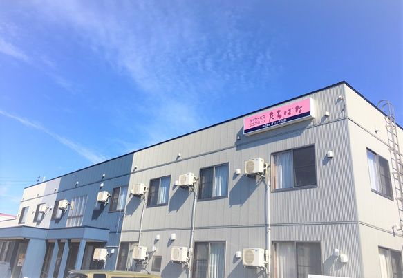 スタッフと利用者の笑顔