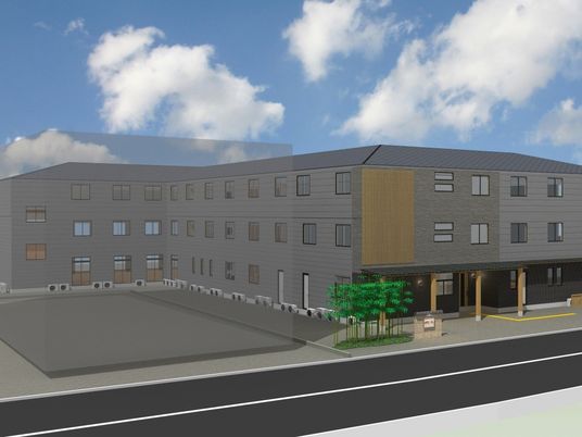 明るい木目調のエントランス