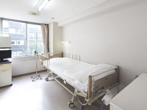 明るい居室のベッド  