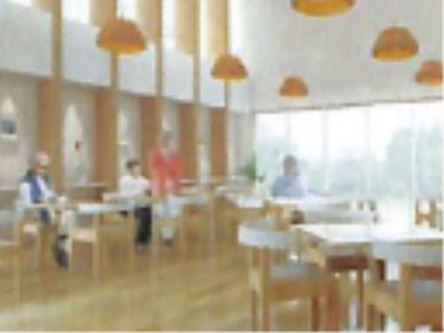 明るい広々としたダイニング ラウンジ 利用者様が食事を楽しむ、ゆとりのあるダイニングです。大きな窓から自然光が差し込み、居心地の良い食事時間を提供しています。