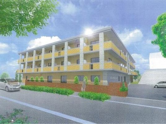 黄色い外壁の建物