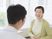 笑顔の利用者と職員