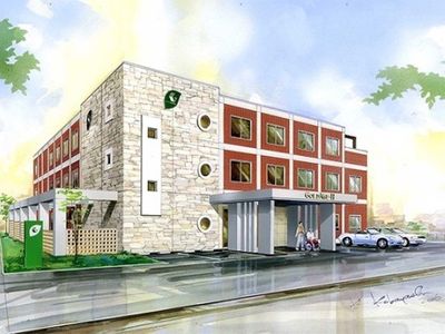 明るい施設の外観図