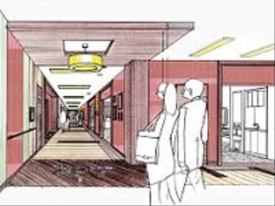 スタッフが歩く廊下