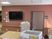 掲示物とテレビのある部屋
