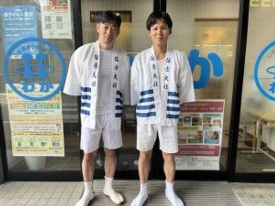 スタッフが立つエントランス  