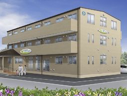 外観と花壇のある建物