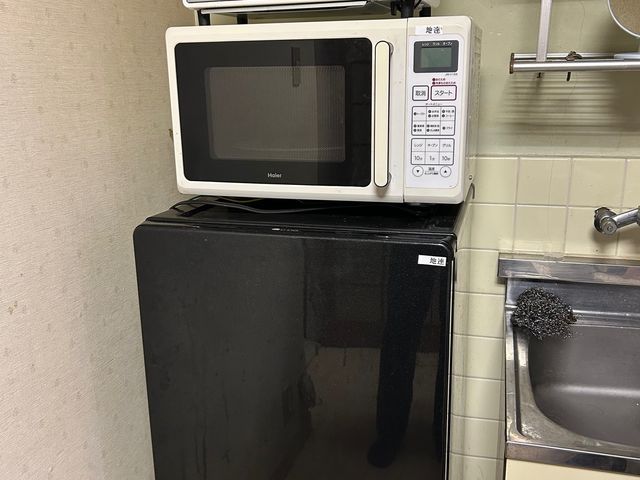 家電が並ぶキッチン 広々としたキッチンは、最新の調理器具が備わり、食事を快適に準備できます。