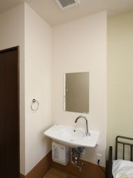 洗面台のある居室の一角