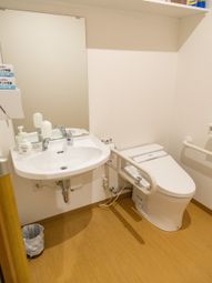 手すり付きトイレの一角