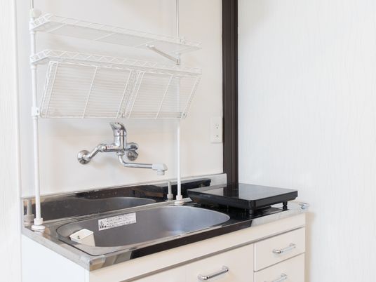 清潔な洗面台とコンロ