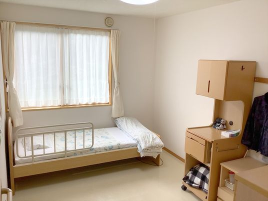 介護職の笑顔の対応シーン