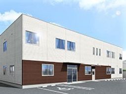 白と茶の外壁の建物