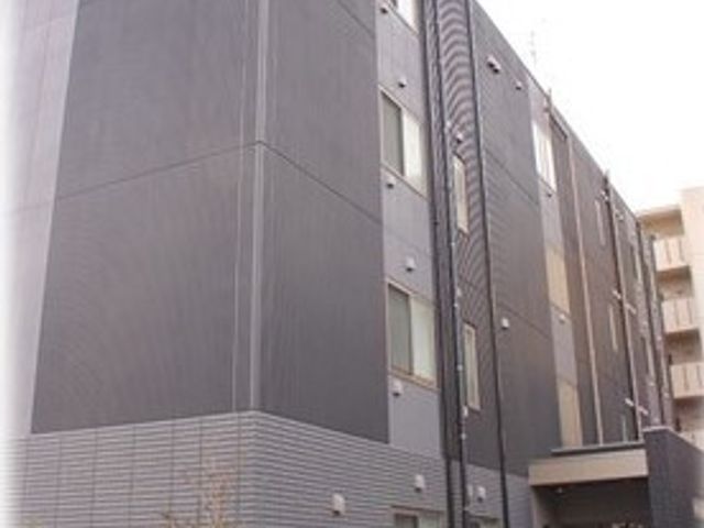 現代的な外観の建物 外観 落ち着いた色合いでデザインされた建物です。周囲の環境に調和しつつ、洗練されたイメージを感じさせます。