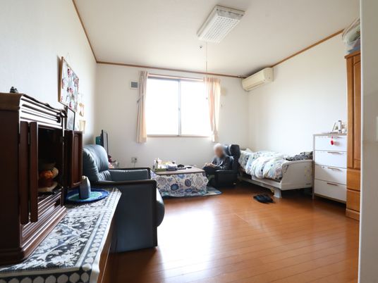 居室と一人の利用者