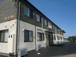 施設の外観と看板