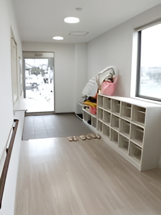 明るい廊下と靴棚