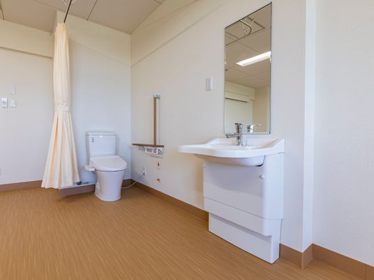 洗面台とトイレのある居室
