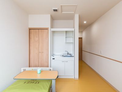 洋室のキッチン付き居室