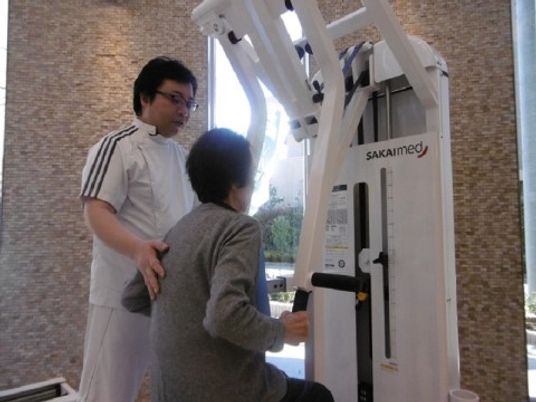 利用者とスタッフのリハビリ風景