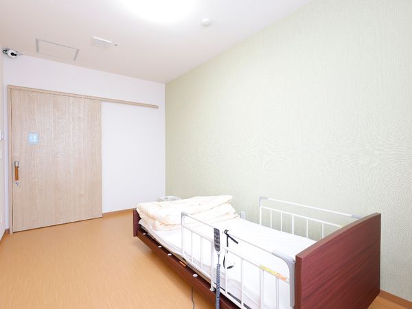 清潔な居室とベッド
