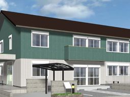 緑の屋根の建物外観