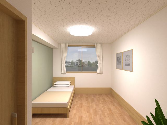 居室の落ち着いた空間 居室 窓辺の緑が心地よい明るい居室。シンプルな造りで、ゆったりとした時間をお過ごしいただけます。