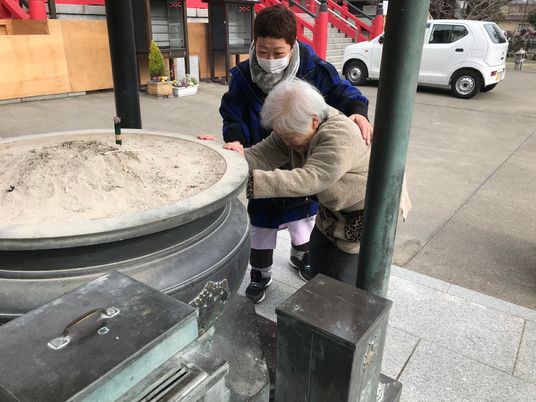 散歩支援のスタッフと利用者