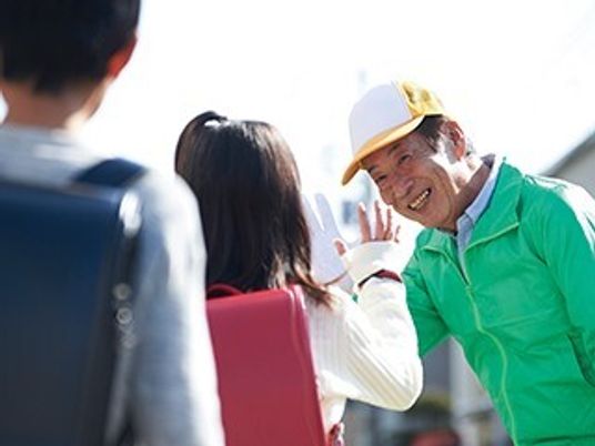 笑顔で挨拶するスタッフ