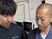 スタッフ2人が並ぶ休憩室  