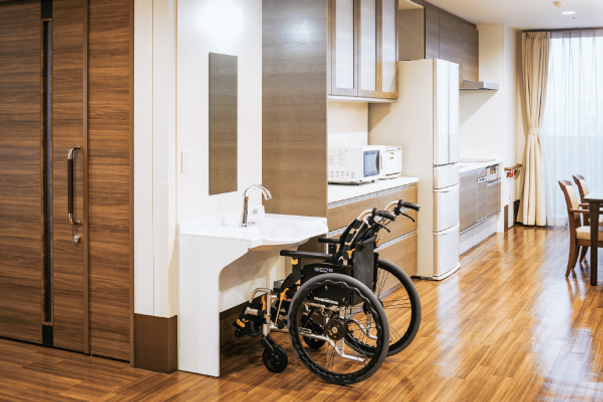 車椅子置かれた共有エリア
