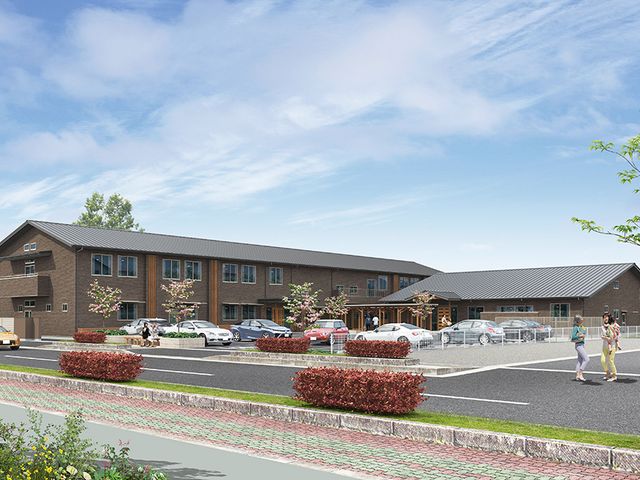 親しみやすい外観 外観 広々とした駐車場を備えた建物です。敷地内には植栽もあり、落ち着いた雰囲気を感じられます。
