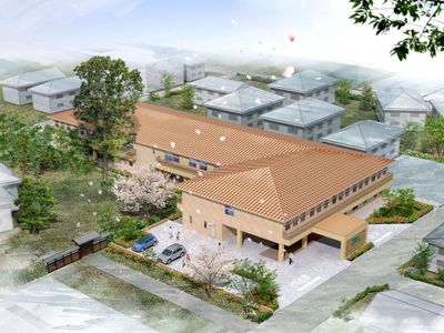 桜のある建物外観