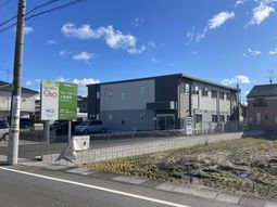 看板付き外観