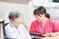 笑顔の介護士と利用者の様子