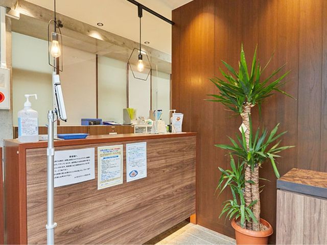 受付ロビー ロビー 温かみのある木目調のロビーは、落ち着いた雰囲気で来客を迎える場所です。