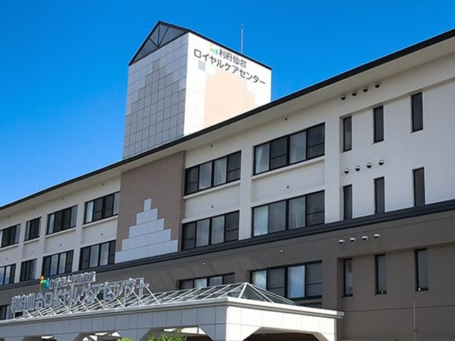 施設の外観 外観   青空の下に建つ、落ち着いた色合いの建物です。就業先として全体の雰囲気をつかみやすい外観です。