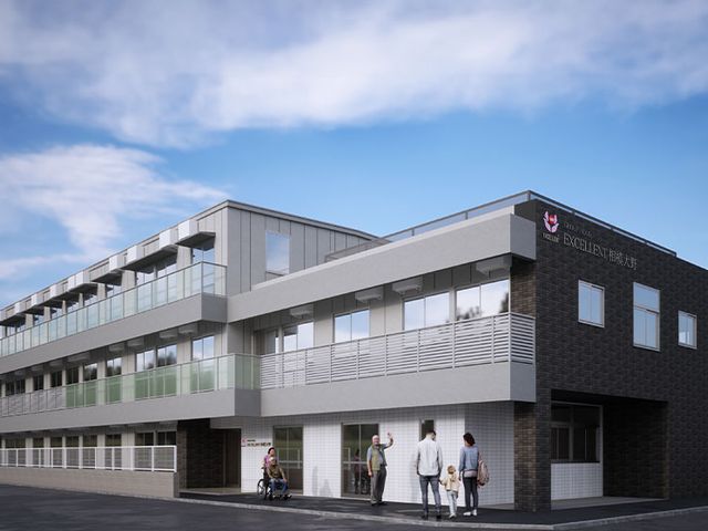 スタッフと利用者の外観 外観 職員が利用者と共に笑顔で歩く外観は、潤いある職場環境を感じさせる光景です。